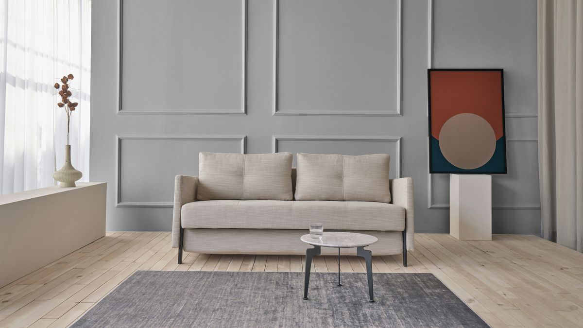 Cubed sofa z podłokietnikami rozkładana.